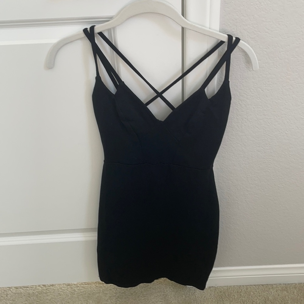 Black mini dress with strap crossing
